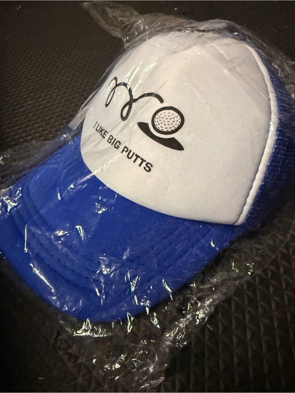 White & Royal Blue Trucker Hat with 'I Like Big Putts' Print